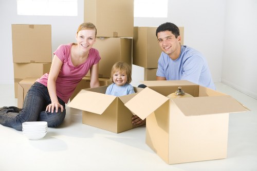 Movers assisting with a home relocation in West Ham