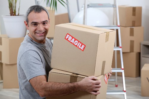 Residential moving day with packed boxes and organised unpacking support in West Ham