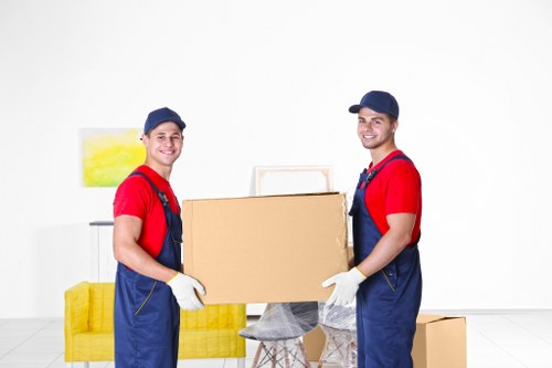 Removal team planning a move in West Ham near local residential streets