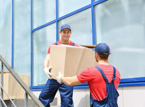 Office relocation boxes and equipment ready for transport