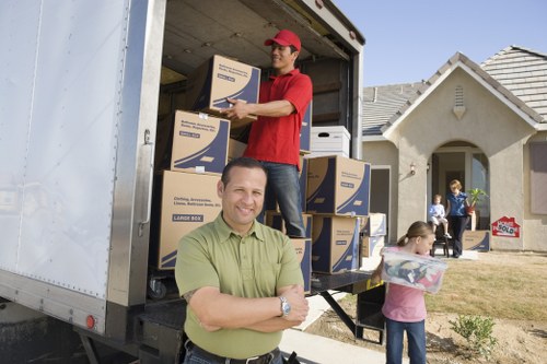 Packing and lifting household items during a West Ham move