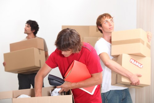 Furniture being handled carefully during a West Ham house move