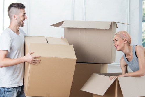 Loading furniture and boxes into a van in West Ham