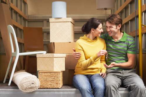 Removal van loading household items for a West Ham move